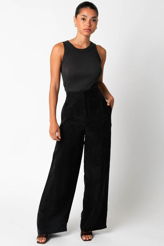 Women’s bottoms collection featuring work pants, jeans, and casual wear