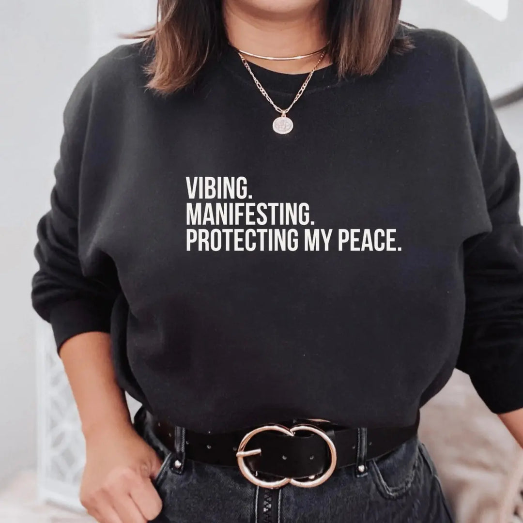 FASON DE VIV Zen Vibing Manifesting black graphic sweatshirt front view