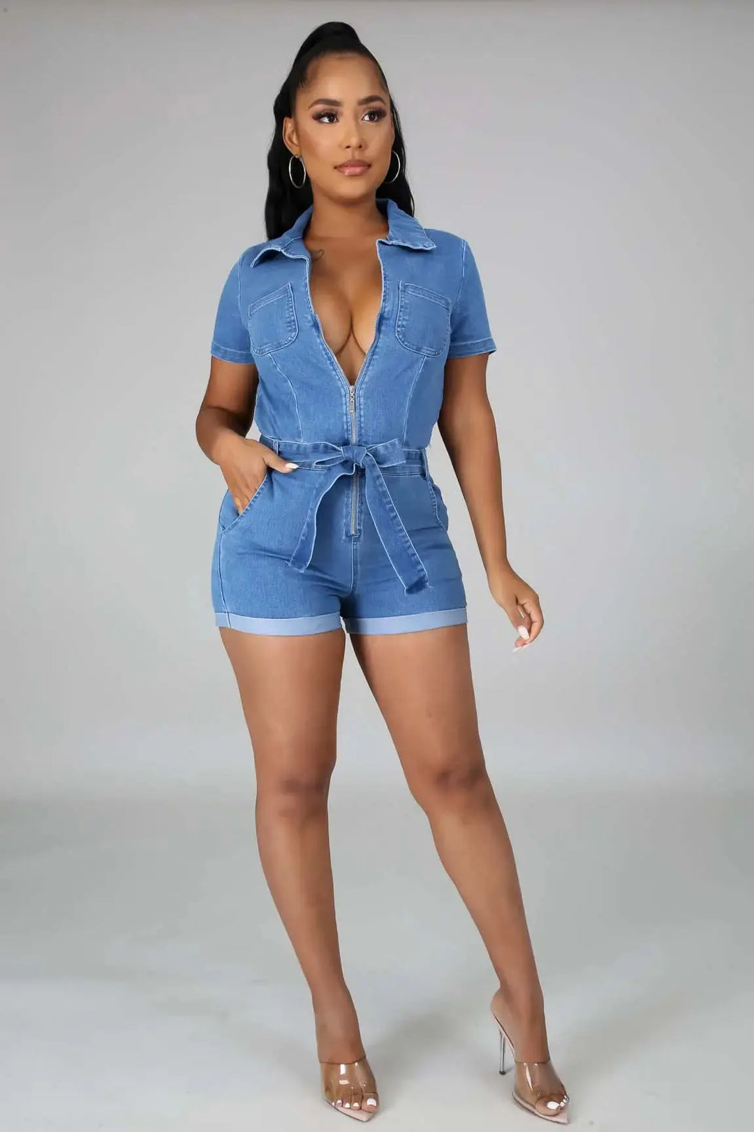 FASON DE VIV Judy Zipper Front Denim Shorts Romper – front view, medium wash stretch denim with tie-waist belt