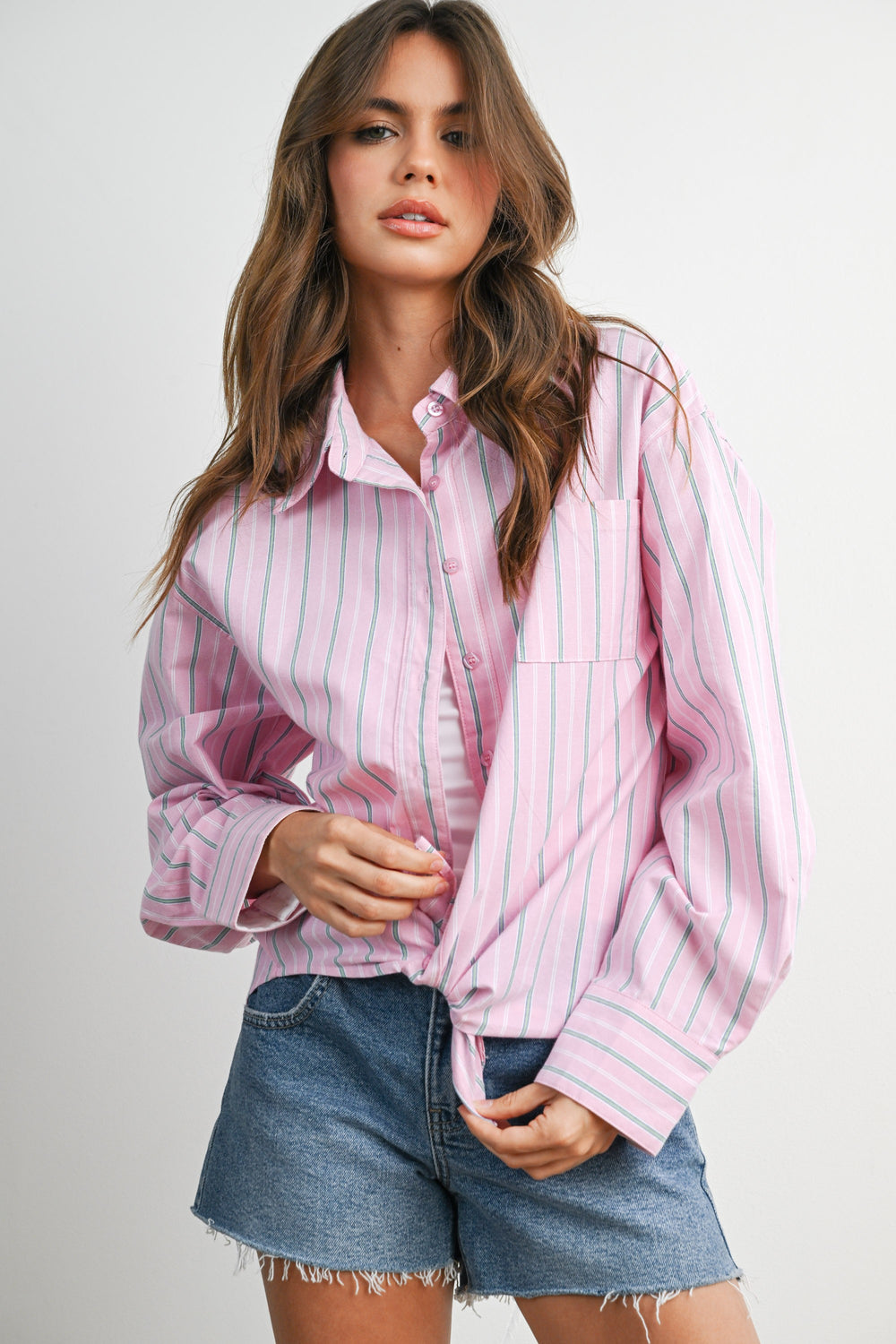 Pink striped long-sleeve button-up shirt, front view showing chest pocket and button detail – FASON DE VIV