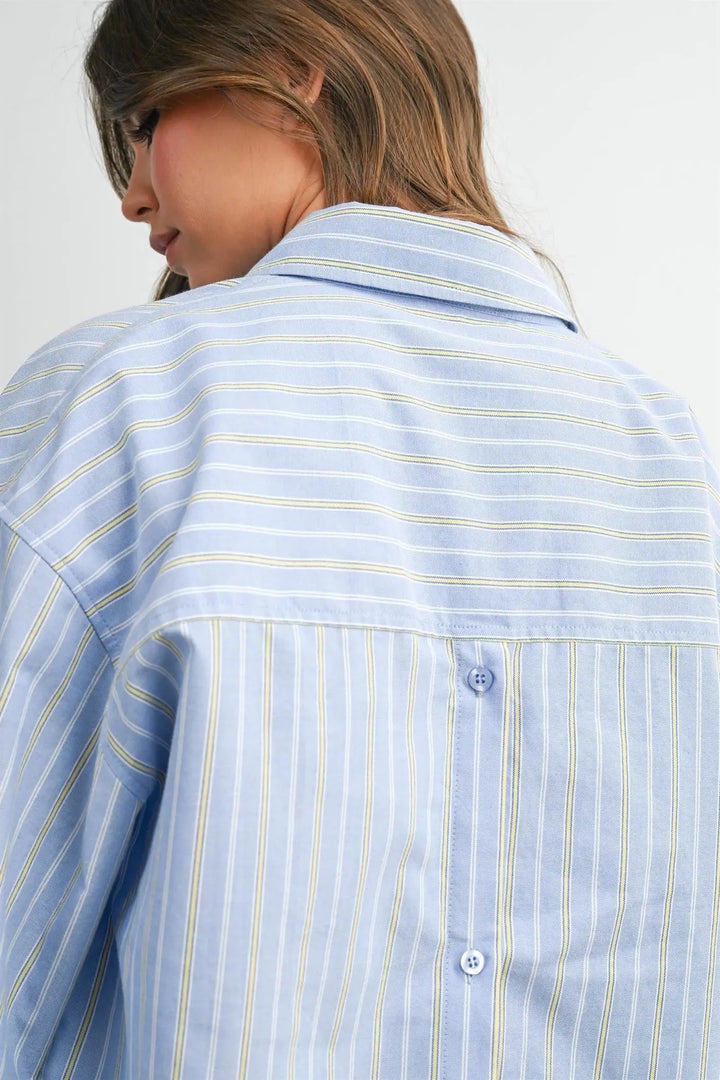 Light blue striped button-up shirt, three-quarter view with contrast white cuffs – FASON DE VIV